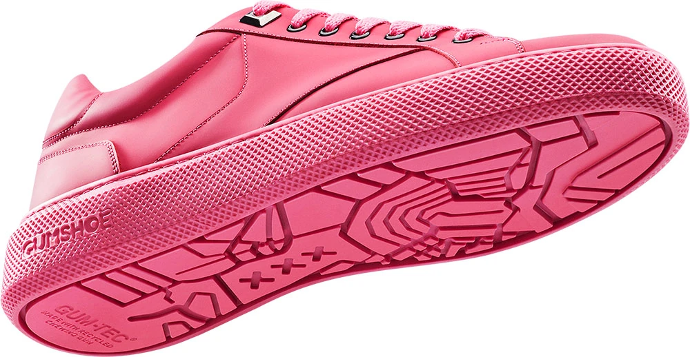 Pink GUMSHOE sneaker showing the upper and patterned outsole